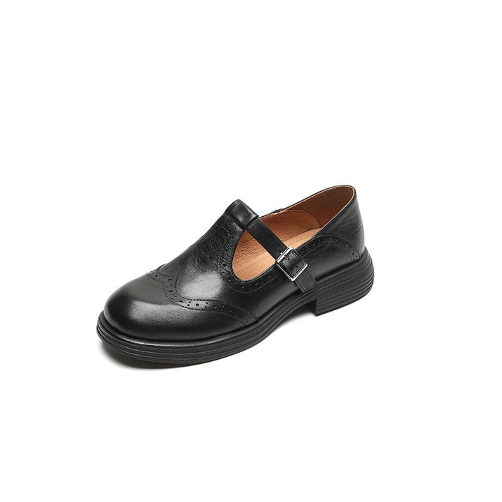 Women's vintage leather Mary Janes, T-strap design with brogue details for everyday comfort.