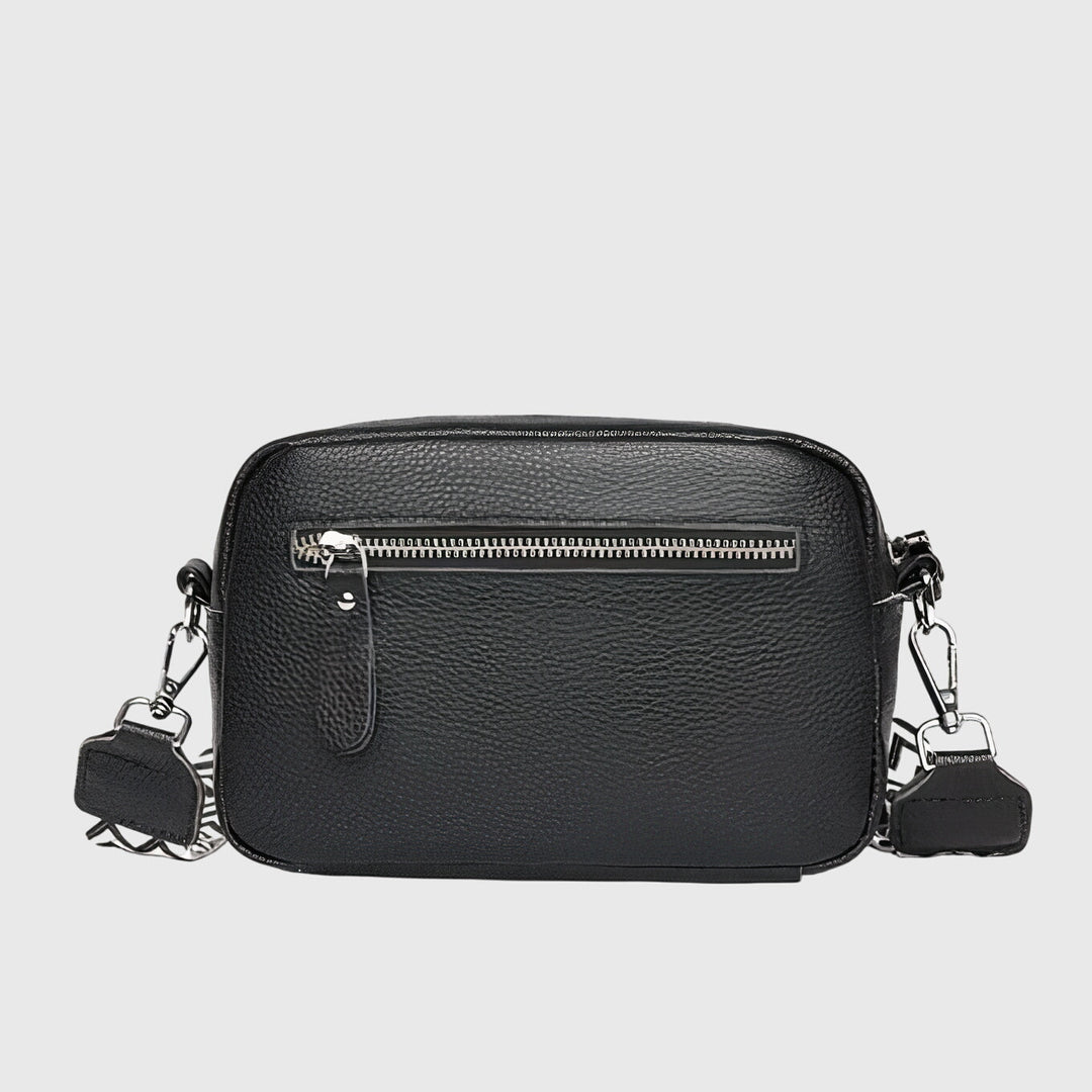 Chic women's leather crossbody bag, a versatile everyday handbag for modern fashion.