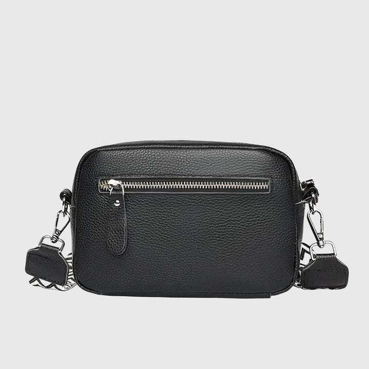 Chic women's leather crossbody bag, a versatile everyday handbag for modern fashion.