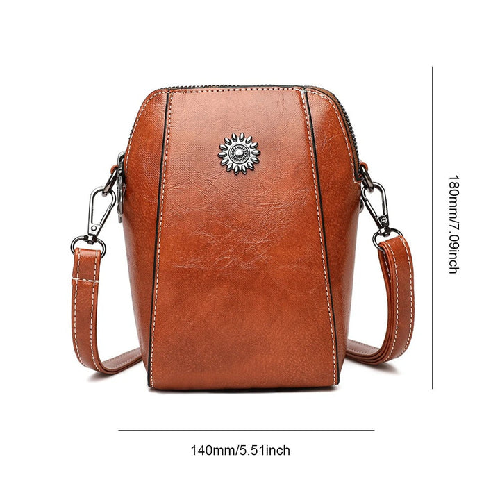 New elegant women's leather shoulder bag, versatile daily use handbag with an adjustable strap.