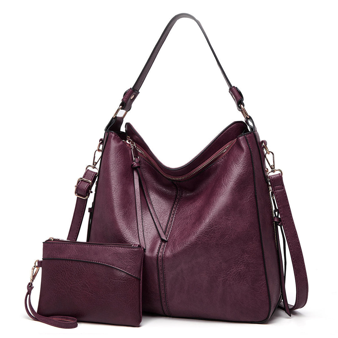 Classic women's leather shoulder bag, timeless design with sophisticated gold details for everyday.
