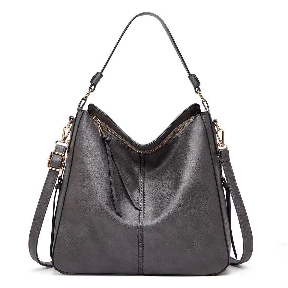 Premium quality women's leather shoulder bag for daily essentials, durable & chic with gold hardware.