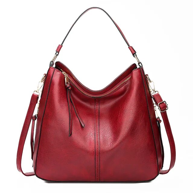 Sophisticated women's leather shoulder purse, ideal for any occasion, featuring elegant gold accents.