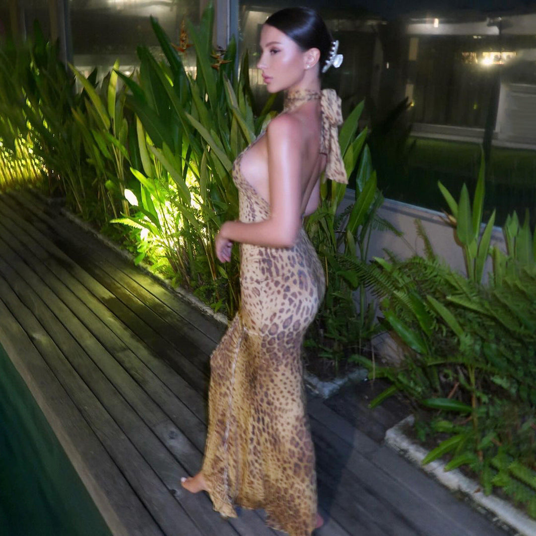 Stunning women's backless leopard maxi dress. Glamorous sleeveless design for parties & evening events.