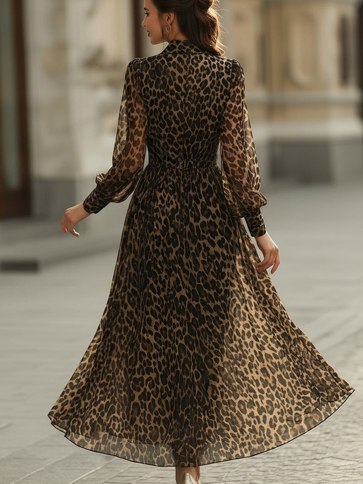 Flowy sheer maxi dress for women, with chic leopard print and long sleeves, ideal for elegant autumn fashion.