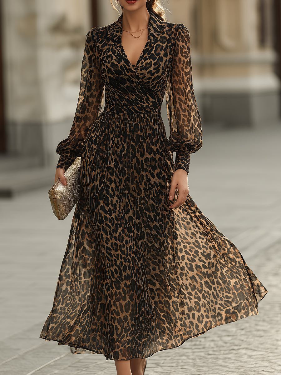 Women's elegant leopard print sheer maxi dress, featuring long sleeves, a V-neck, and a sophisticated flowy silhouette.