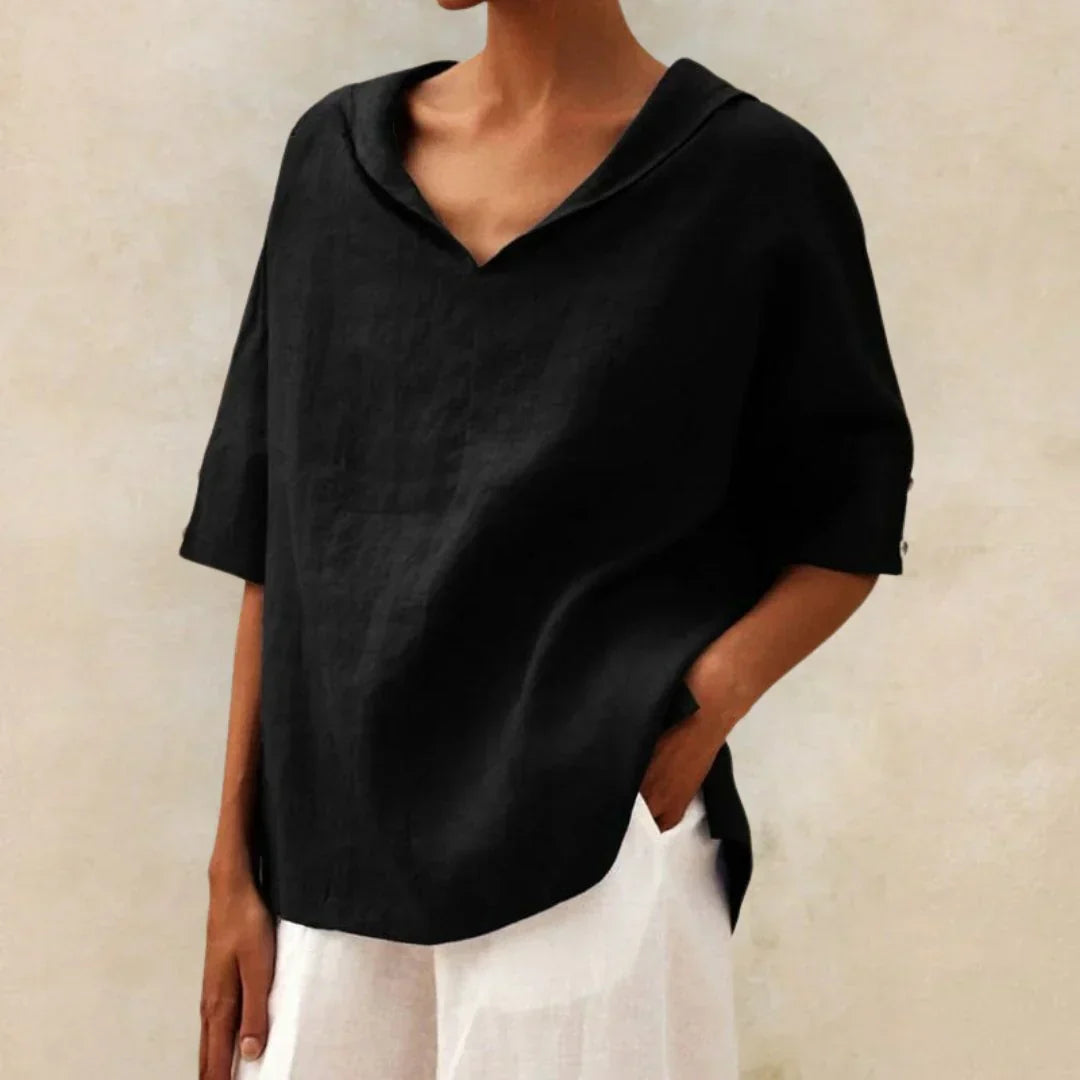 Collared linen button-up shirt for women, designed for stylish and comfortable warm weather fashion.