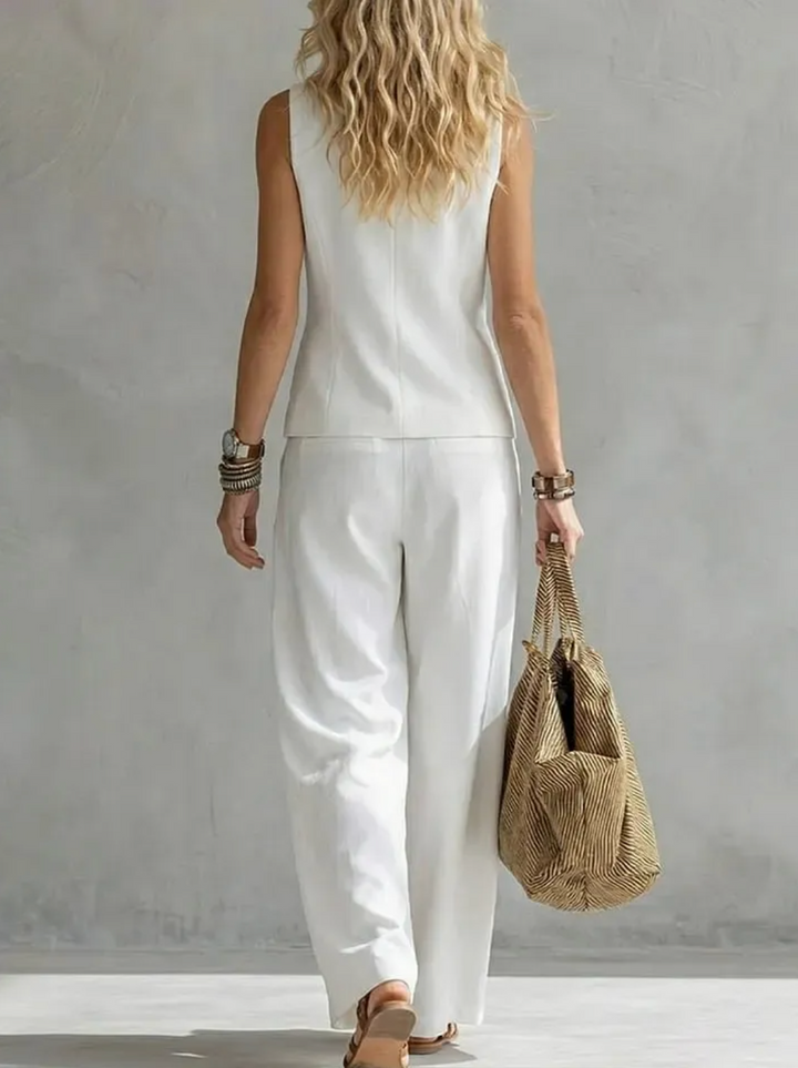 Modern women's linen look gilet & wide leg trousers. Comfortable, elegant two-piece matching set.