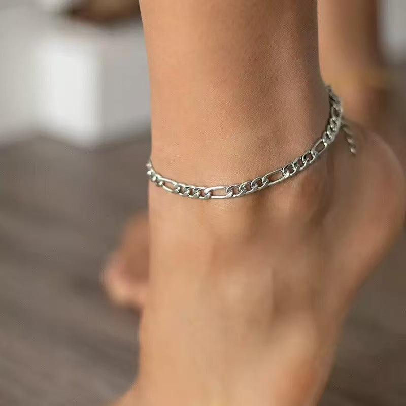 Chic women's link chain anklet. Adjustable gold or silver-tone jewelry, a perfect foot accessory.