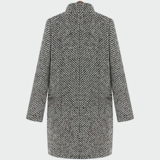 Sophisticated women's long coat in a classic style. Versatile outerwear for elegant autumn & winter fashion.
