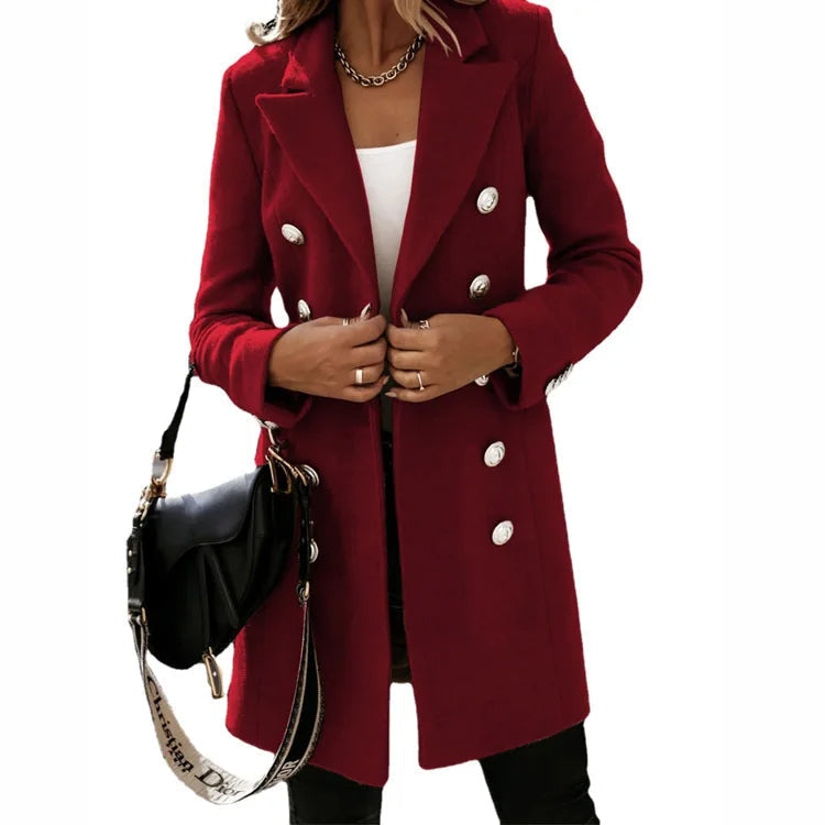 Sophisticated tailored long double-breasted women's winter coat, offering classic elegance & warmth.