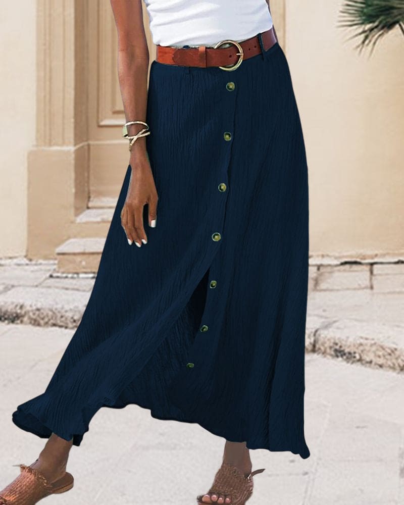 Flowing women's long monochrome A-line maxi skirt, an elegant and versatile choice for many occasions.