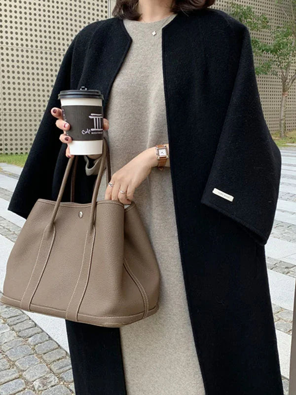 Elevate your style with this women's elegant long open front winter coat, a versatile layering piece.