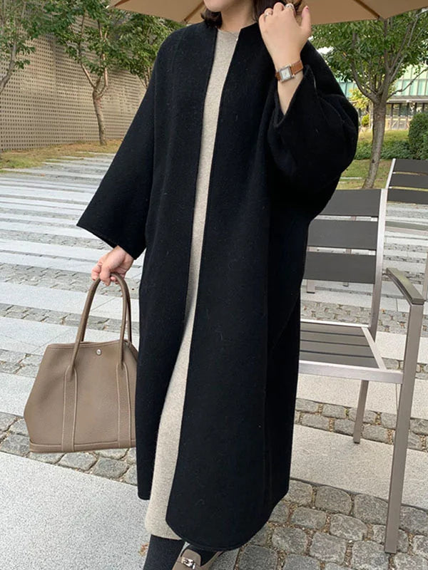 Comfortable women's long open front winter coat, ideal for elegant seasonal outerwear and layering.