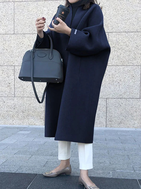 Elegant women's open front long coat, a chic oversized piece for sophisticated fall and winter fashion.