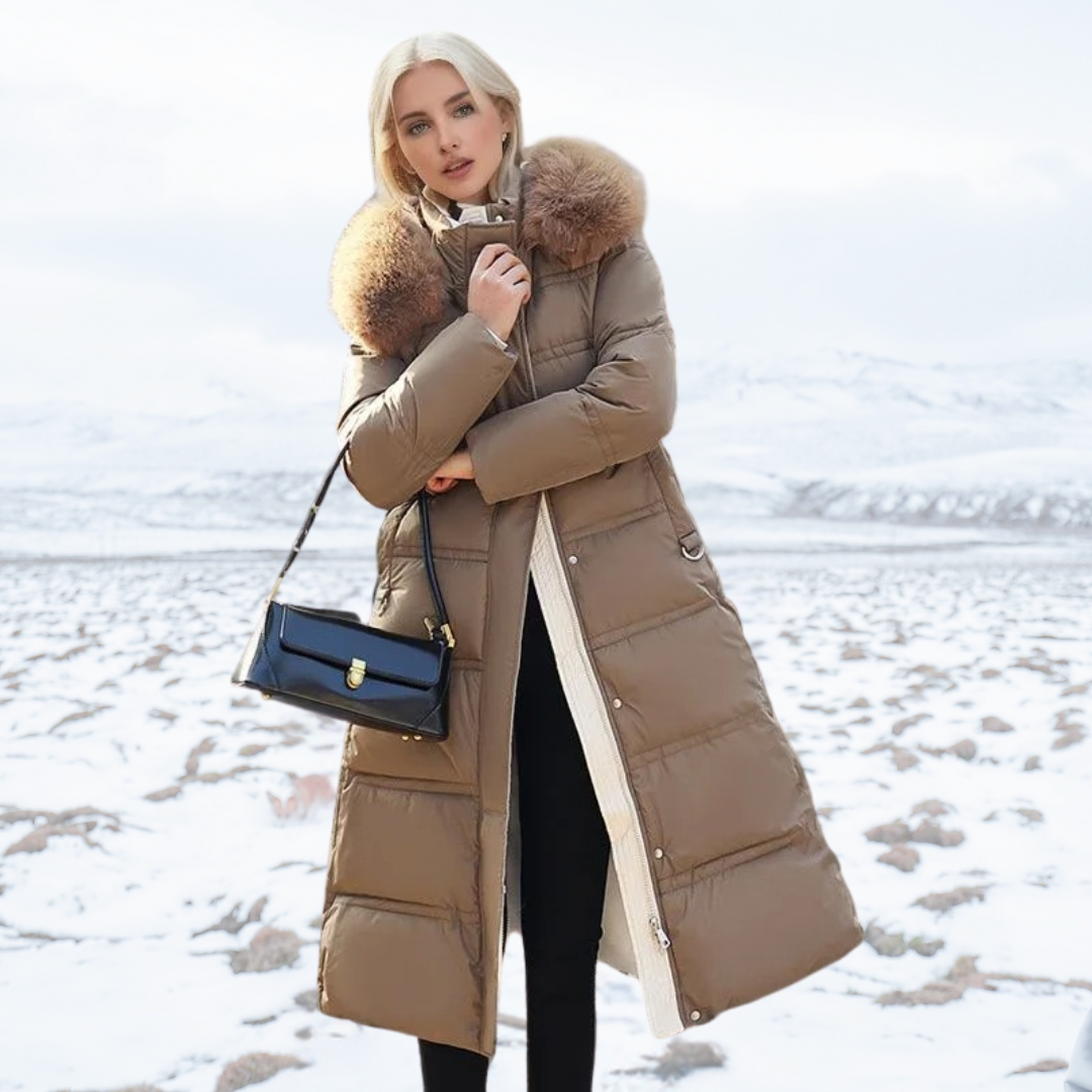 Elegant women's long puffer coat with a faux fur hooded collar, perfect for stylish cold weather outerwear.