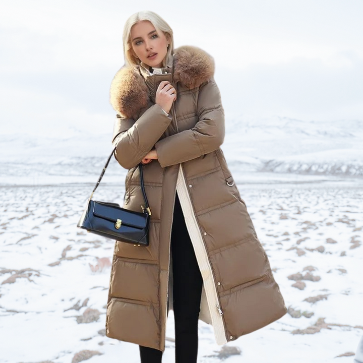 Elegant women's long puffer coat with a faux fur hooded collar, perfect for stylish cold weather outerwear.