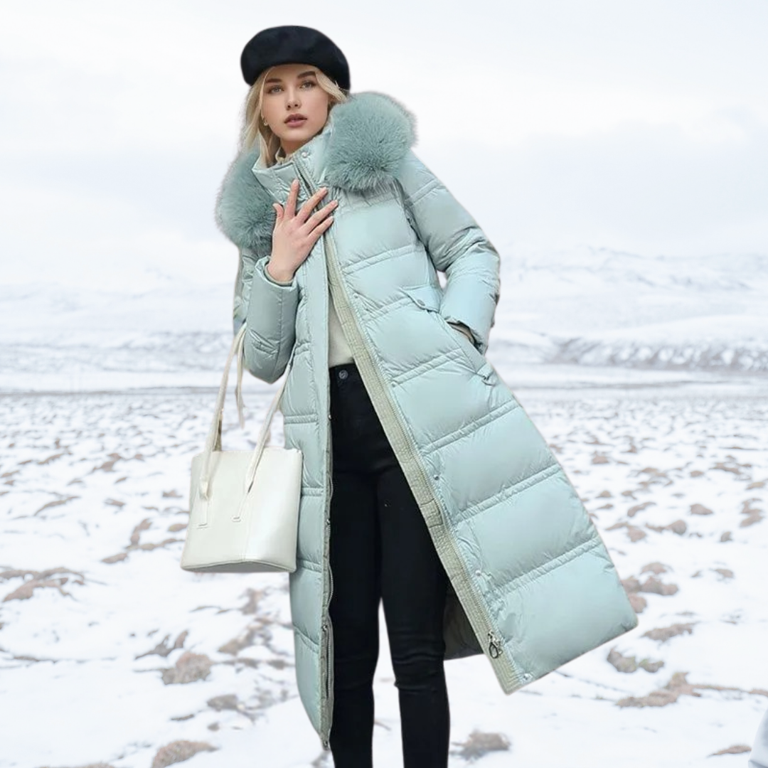 Stylish women's long puffer coat with a warm faux fur hood, designed for ultimate cold weather protection.