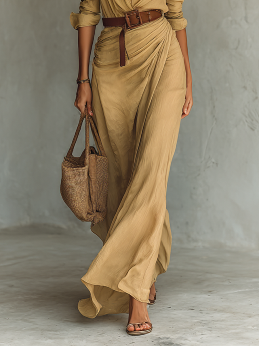 Comfortable & elegant women's long shirt dress, versatile for day or evening. Features a stylish belt.
