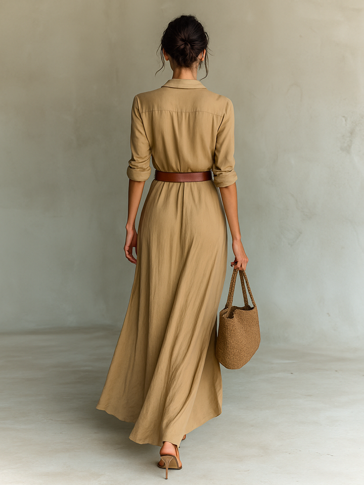 Stylish women's belted long shirt dress with elegant collar and button-front. Versatile day-to-evening style.