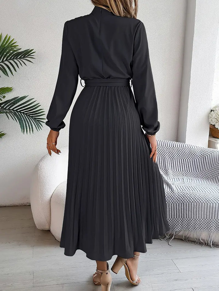 Women's elegant long-sleeve belted midi dress. Flattering, versatile, ideal for fall/winter work & cocktails.
