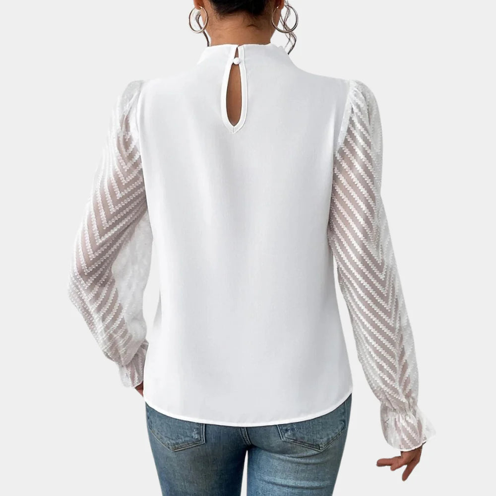 Fashionable women's long sleeve blouse, elegant and casual. Features patchwork design & butterfly sleeves. Perfect for summer.