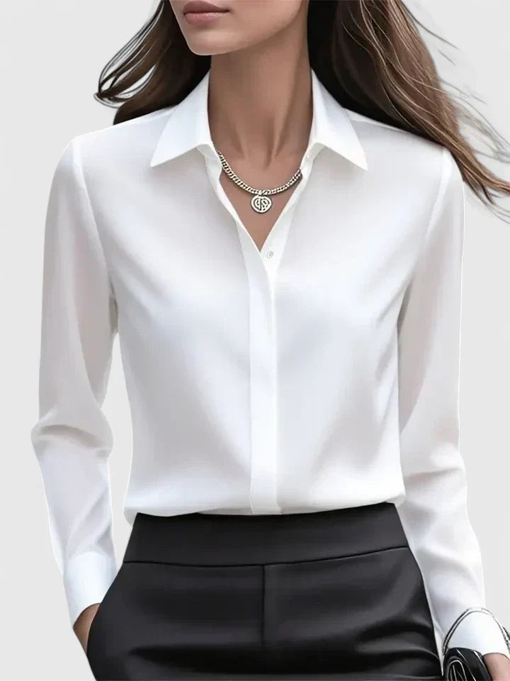 Chic women's everyday blouse, a versatile long-sleeve button-down top for casual or dressed-up looks.