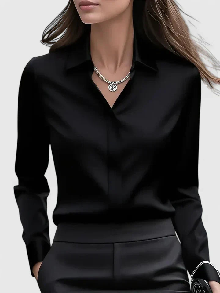 Professional women's button-down top, a sophisticated long-sleeve blouse for modern office fashion.
