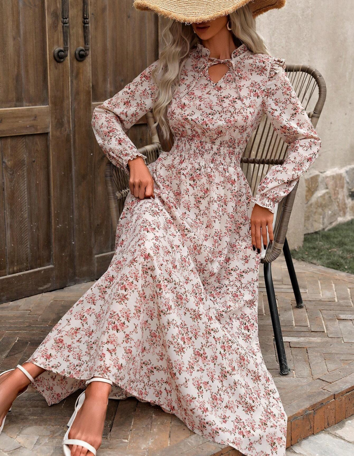 Elegant women's long sleeve floral A-line midi dress, perfect for spring casual or summer occasion wear.