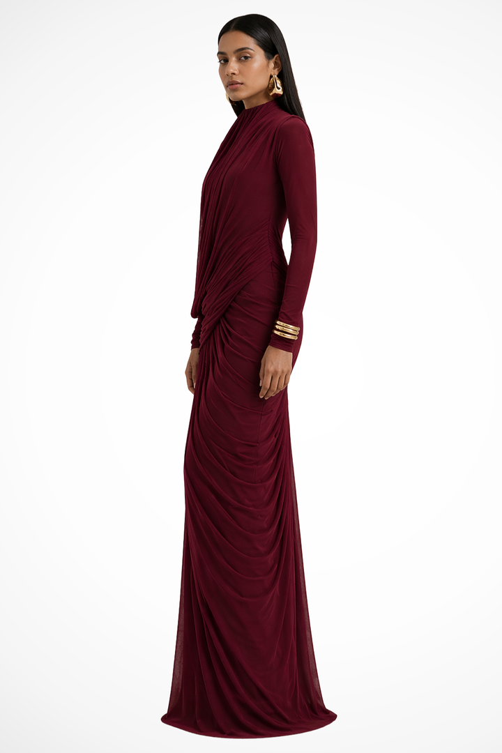 Burgundy draped maxi dress for women, featuring a high neck and long sleeves. Perfect wedding guest attire.