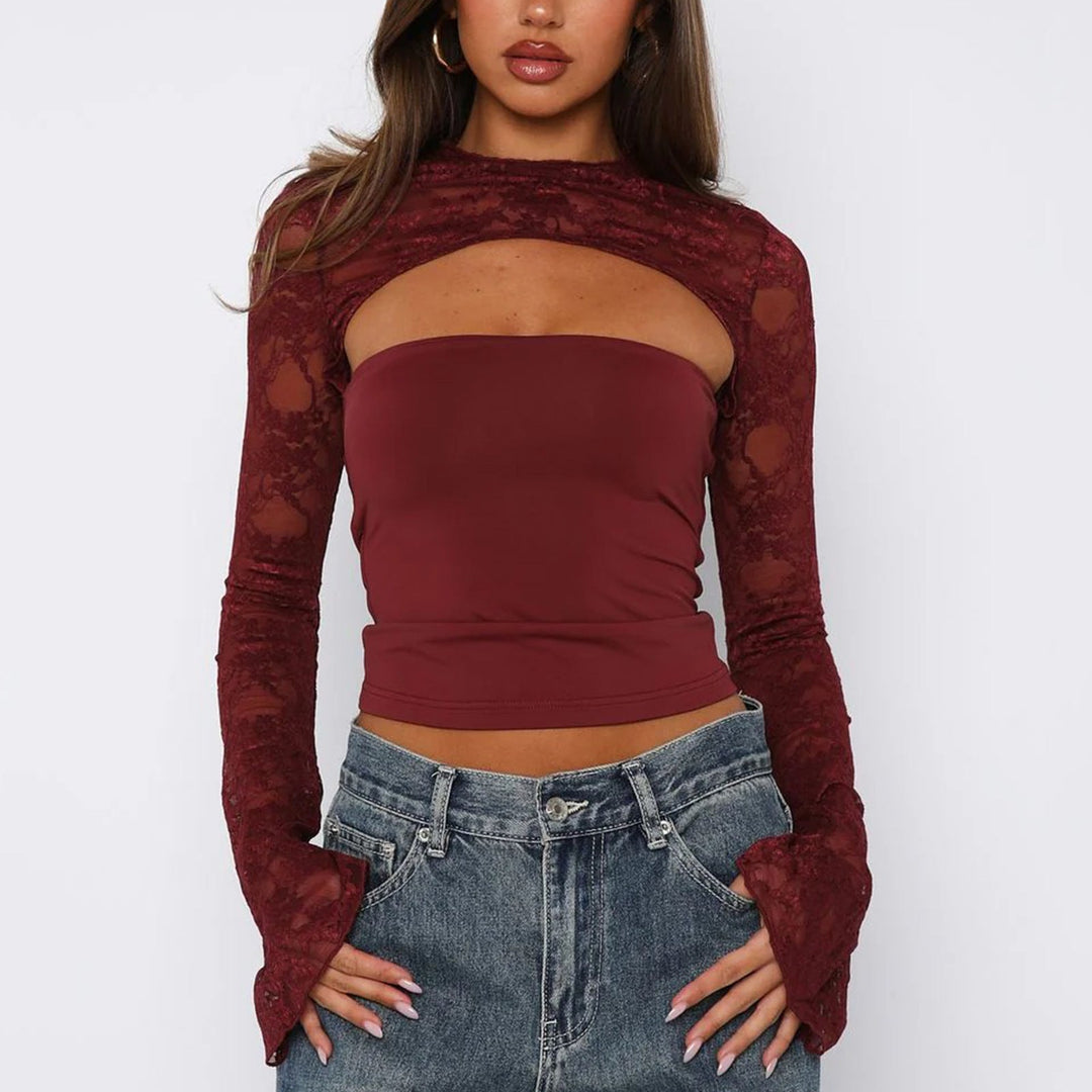 Fitted elegant women's lace cut-out long sleeve top, a stylish party blouse with modern design.