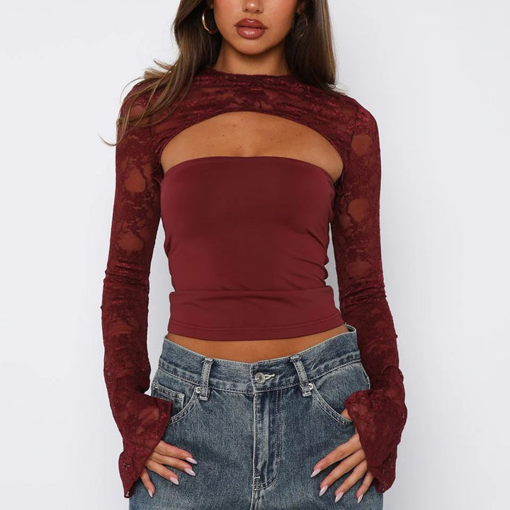 Fitted elegant women's lace cut-out long sleeve top, a stylish party blouse with modern design.