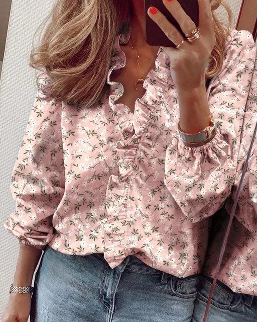 Chic women's long sleeve blouse with ruffles, a versatile top for elegant casual or office attire.