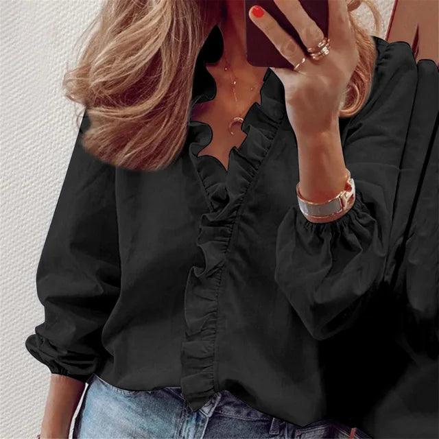 Stylish women's long sleeve ruffle shirt, a fashionable elegant top for versatile wear and special occasions.