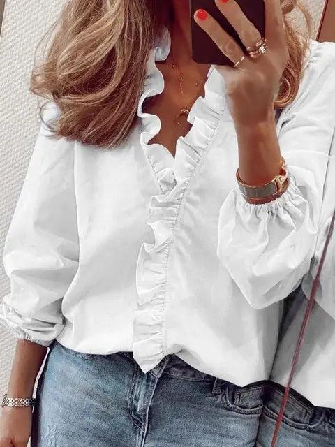 Beautiful women's elegant ruffle blouse with long sleeves, a chic top for stylish office wear or parties.