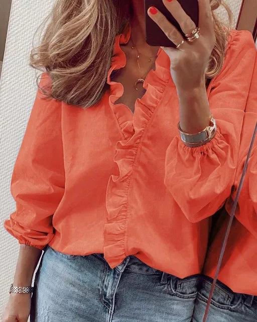 Women's elegant long sleeve ruffle blouse, a chic and stylish top perfect for versatile wear from office to party.