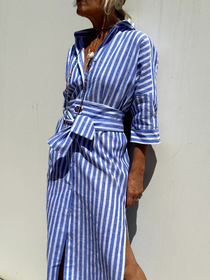 Striped women's long sleeve belted shirt dress; an elegant midi for office, autumn casual, or everyday wear.
