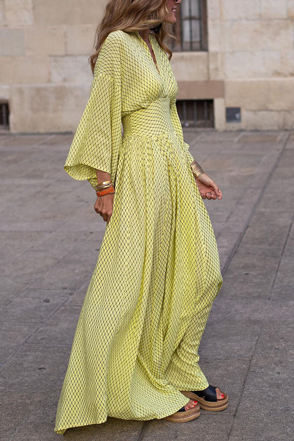 Elegant women's long sleeve V-neck midi dress, perfect for spring or autumn, highlighting a flattering silhouette.
