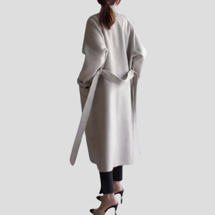 Women's elegant long winter coat, ideal for cold weather, featuring button-front and high collar.