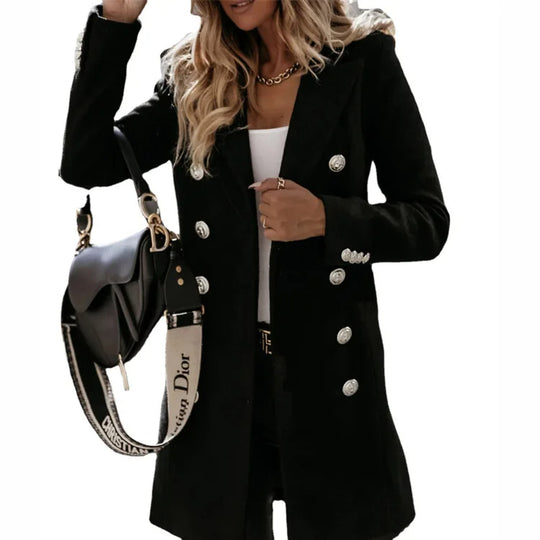 Warm women's long fashion coat. Elegant winter outerwear, a sophisticated and chic tailored jacket for ladies.