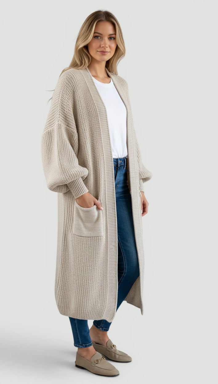 Elegant women's longline layering cardigan with sophisticated bell sleeves.