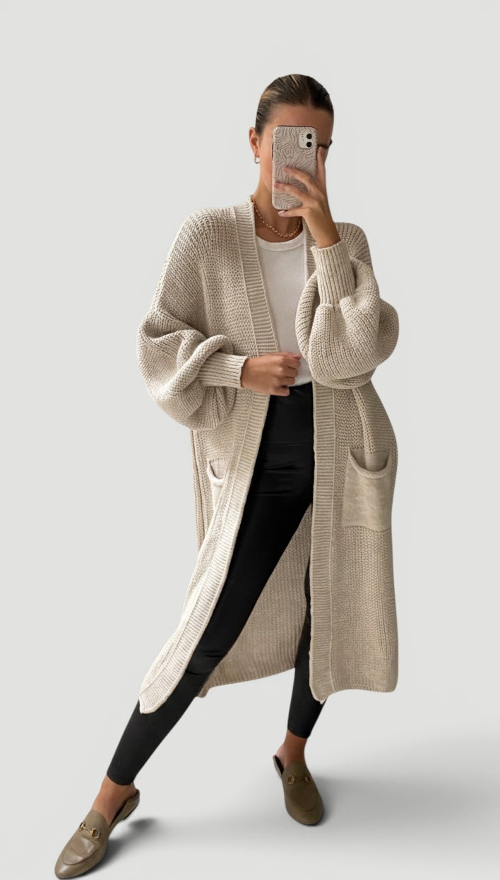 Stylish women's open-front longline cardigan, perfect for cozy layering.