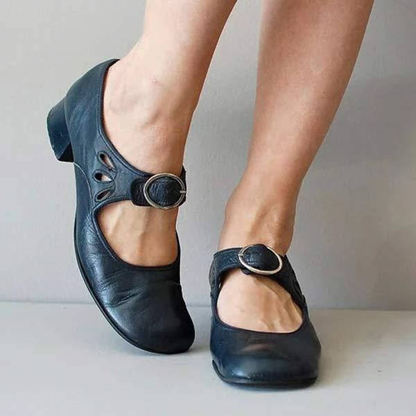 Elegant women's low heel pumps with a rounded toe, perfect for comfortable all-day office wear or versatile casual styling.