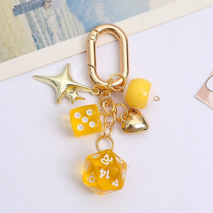 Shiny metal lucky charm keychain with vibrant colored beads and a unique dice design, women's bag & key accessory.