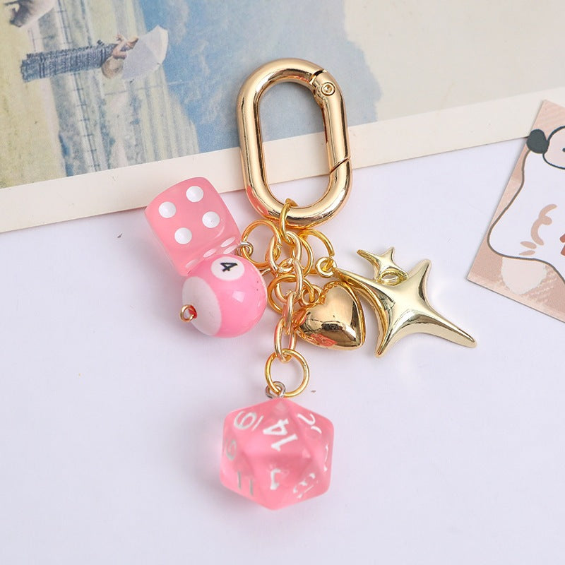 Stylish metal lucky charm keychain for women, featuring colorful beads and durable dice charm, for bags & keys.
