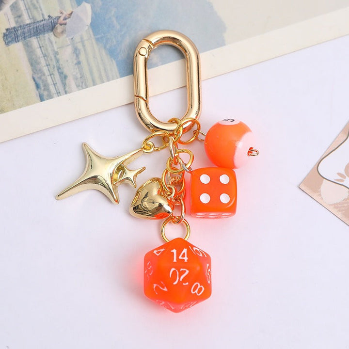 Durable metal lucky charm keychain for women, colorful beads & dice, adds charm to keys or bags. Stylish accessory.