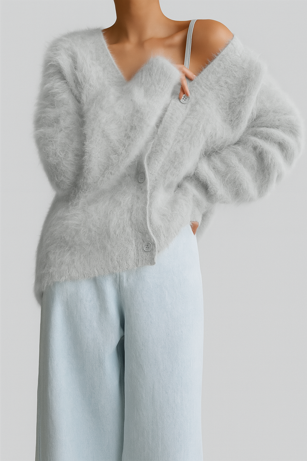 Elegant women's luxe cardigan with relaxed fit, perfect for versatile layering & chic style year-round. Button front design.