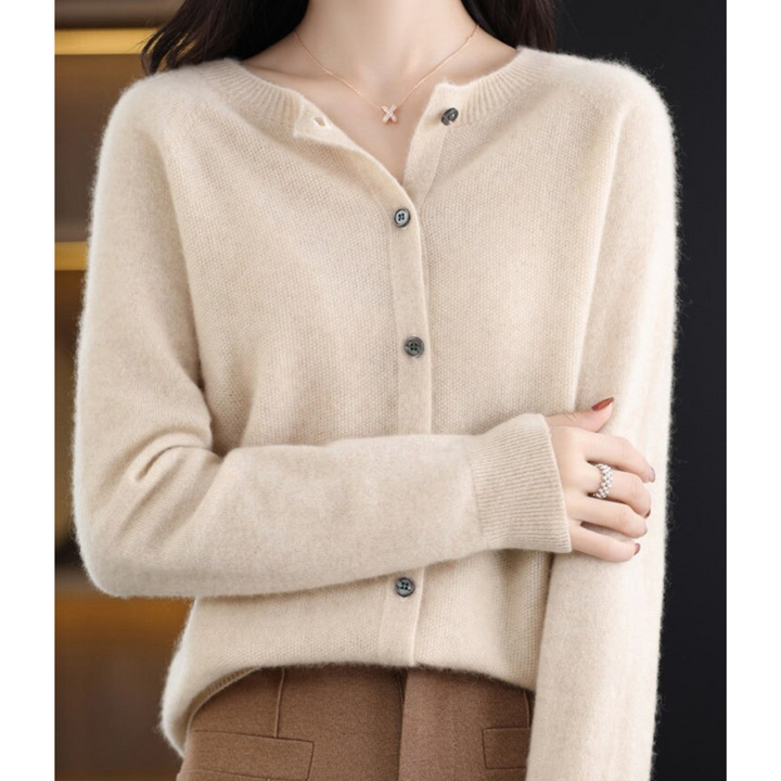 Women's cozy O-neck cardigan, a luxurious and elegant sweater for essential winter layering.