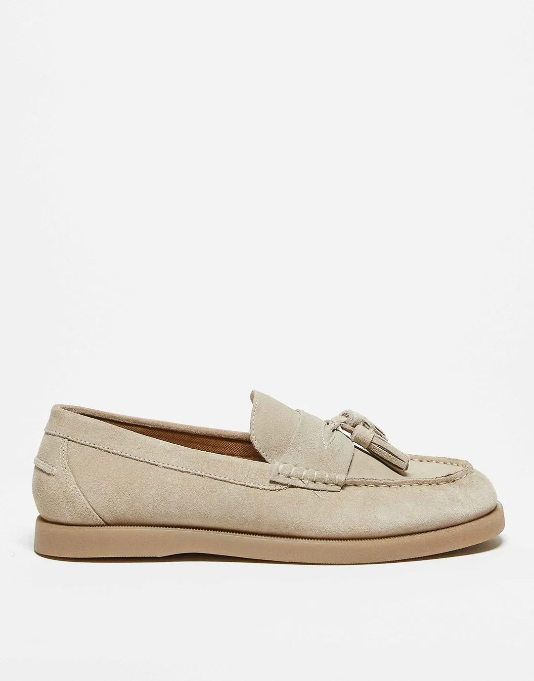 Elegant women's luxury tassel loafers. Stylish slip-on dress shoes for versatile comfort & effortless style.