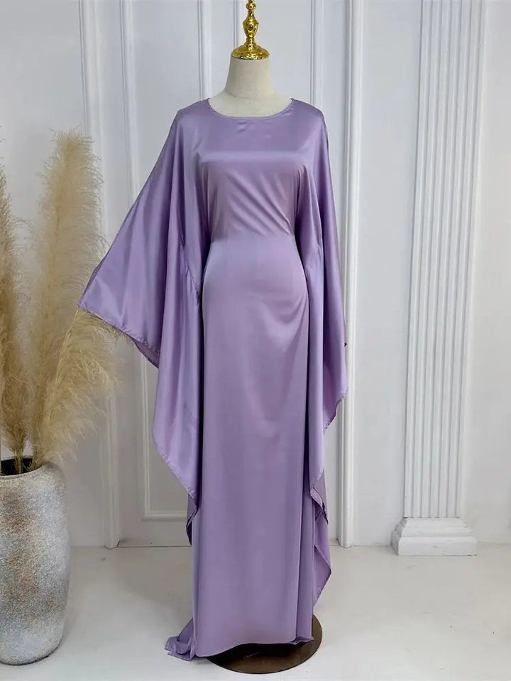 Modern sleeveless evening gown for women, featuring a flattering fit and a trendy high slit design.